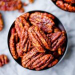 Overhead image of a dish of Texas glazed pecans.