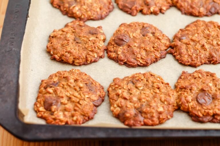 Freshly baked cookies on a baking sheet.