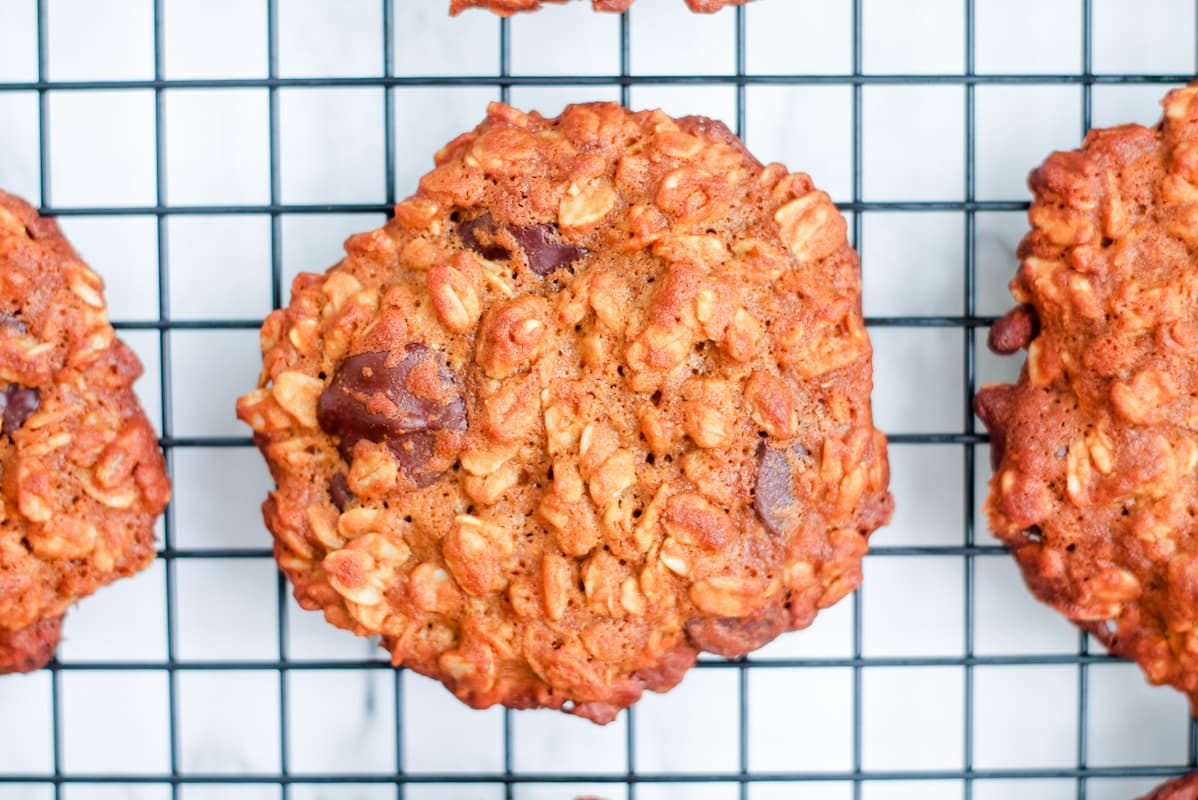 Overhead image of flourless oatmeal cookies on a wire rack.