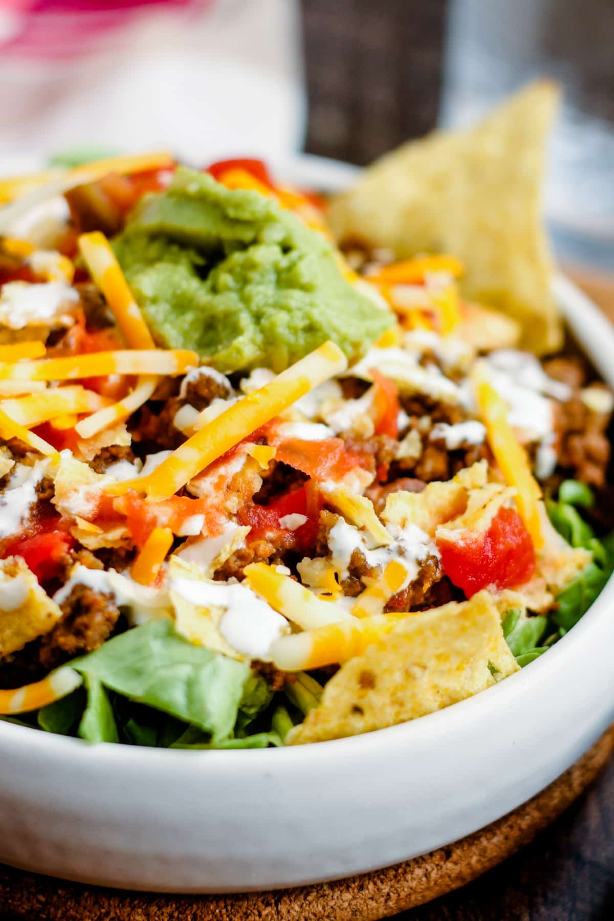 Close up image of a healthy taco salad with ground beef.