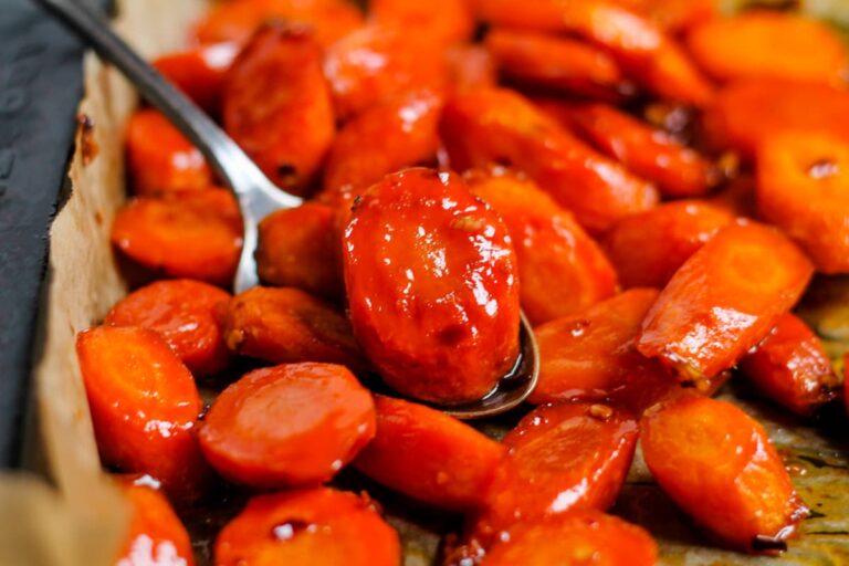 A baking sheet of maple roasted carrots.