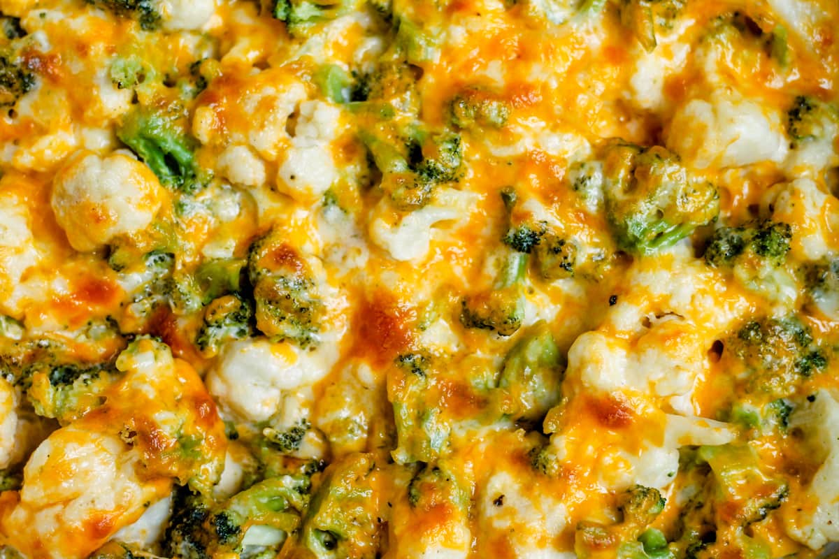 Closeup image of a broccoli cauliflower cheese casserole.