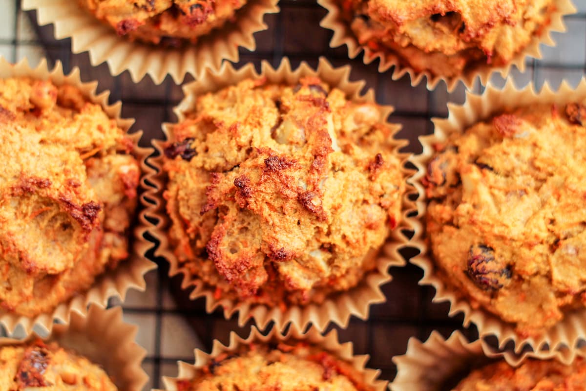 A batch of coconut flour muffins with carrots and raisins.