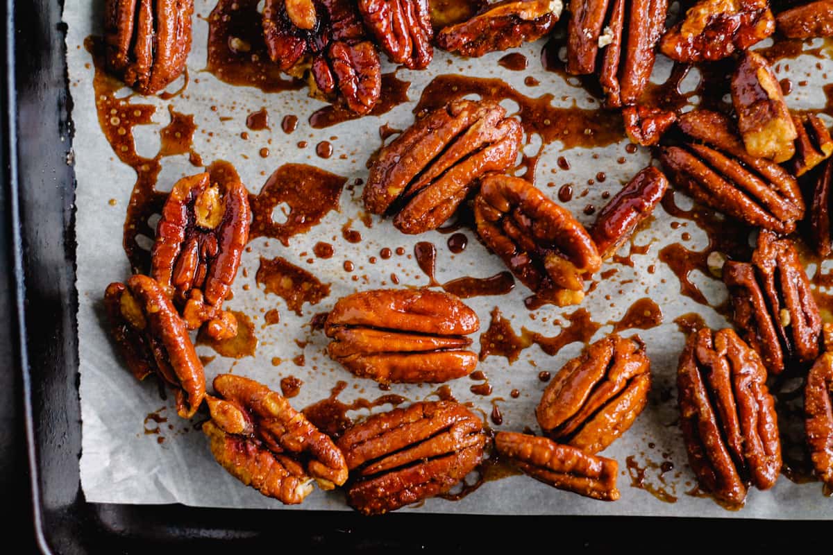 Roasted nuts on a baking sheet.