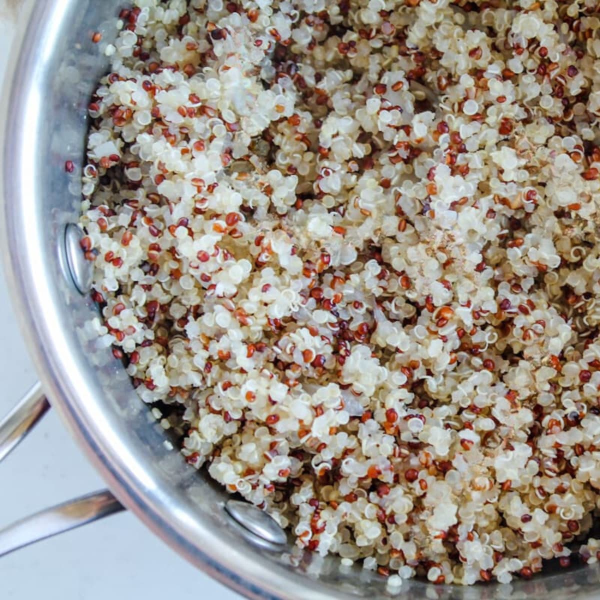 A pot of cooked quinoa.
