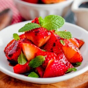 A plate of balsamic strawberries.