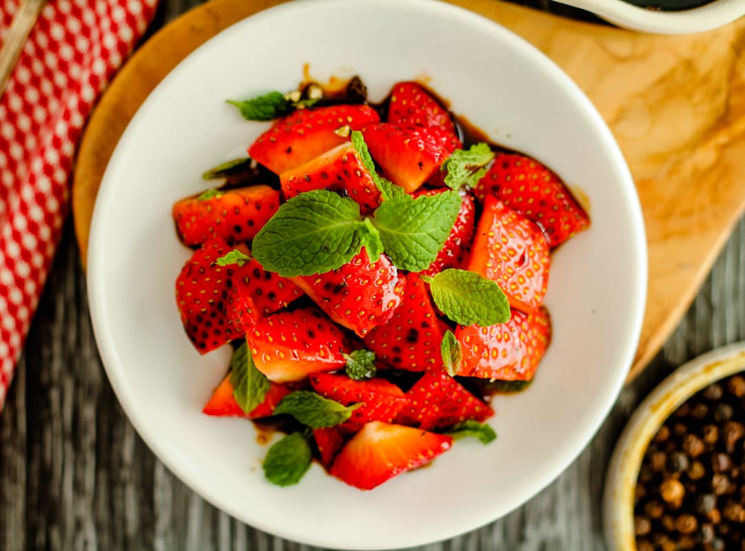 A plate of balsamic strawberries.