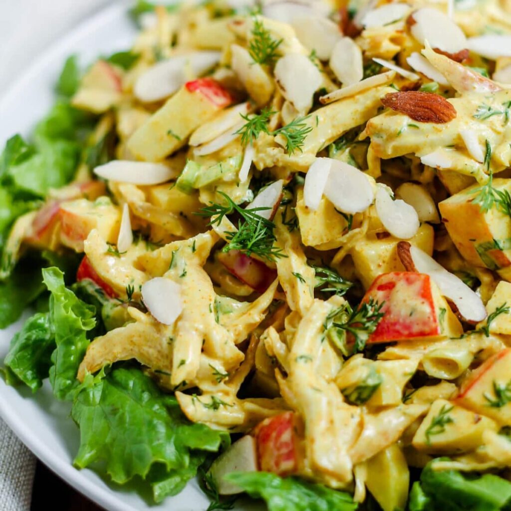 A curry chicken salad on a plate.