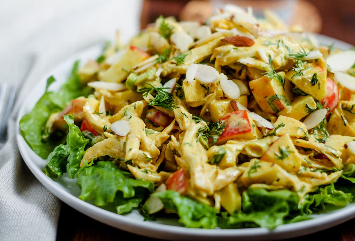 A curry chicken salad on a plate.