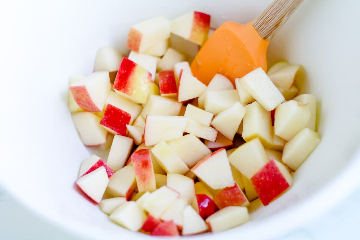Chopped apples in a mixing bowl.