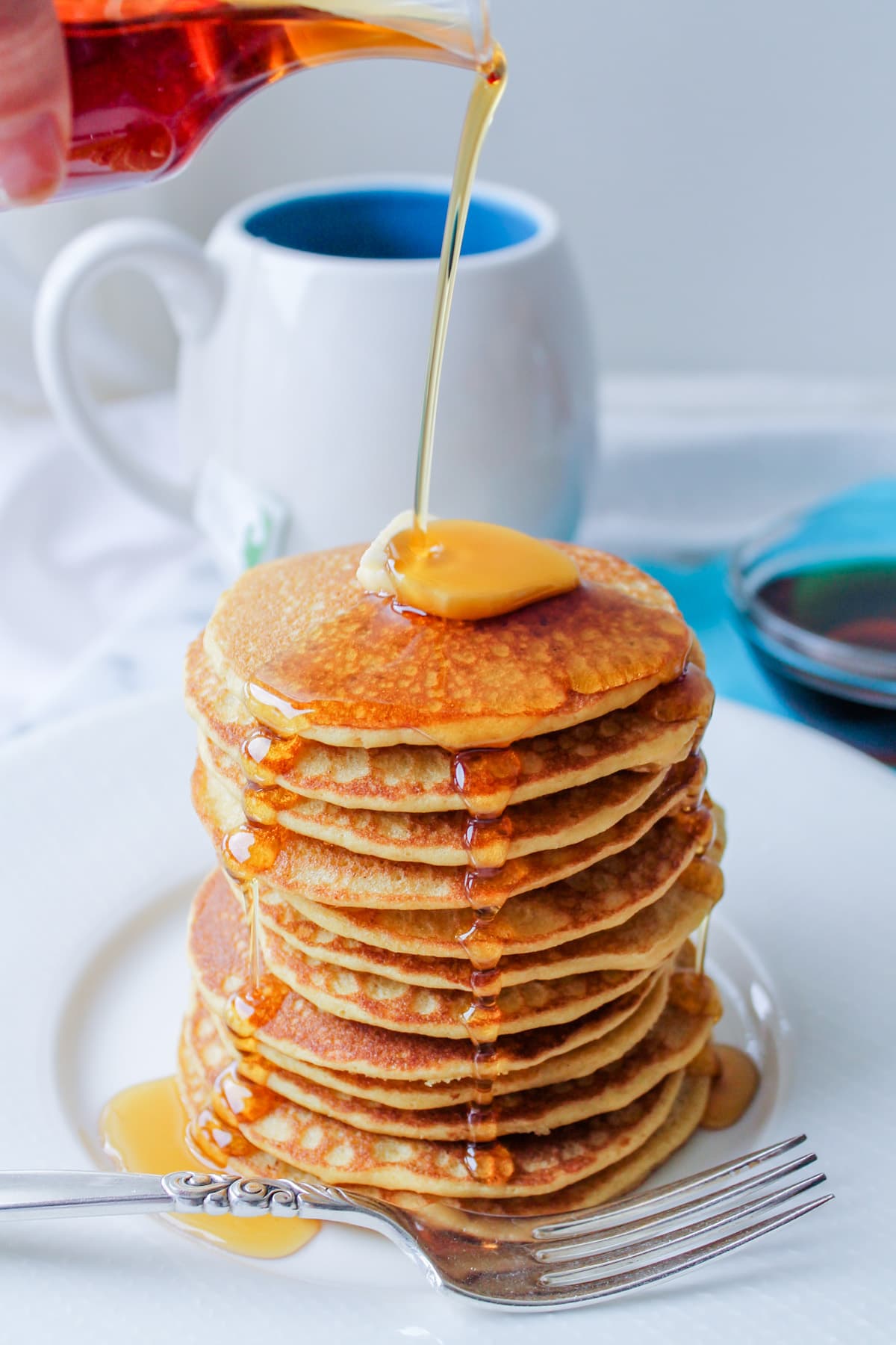 A stack of gluten free grains based brown rice flour pancakes.