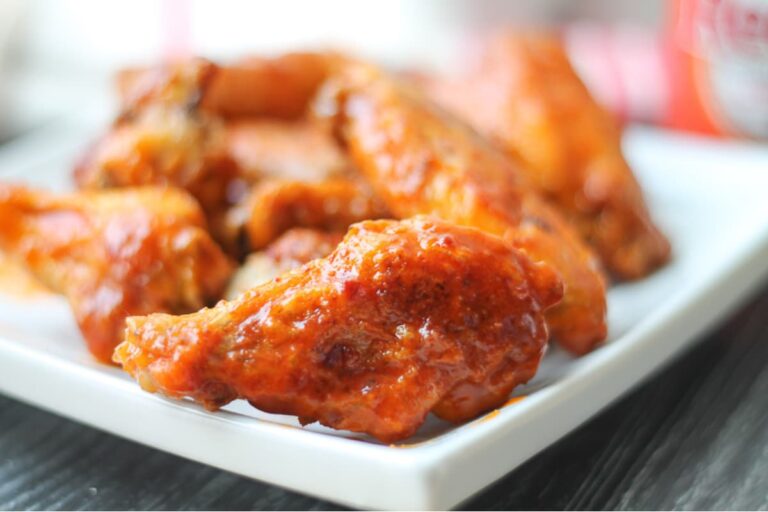 A plate of buffalo wings.