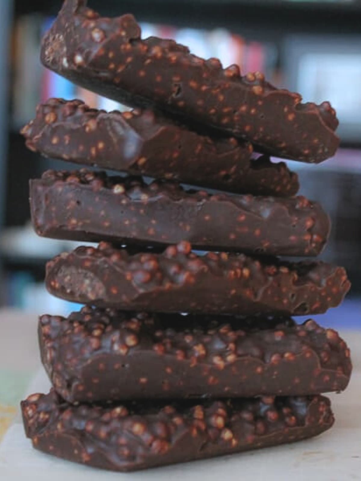 A stack of puffed quinoa crunch bars.