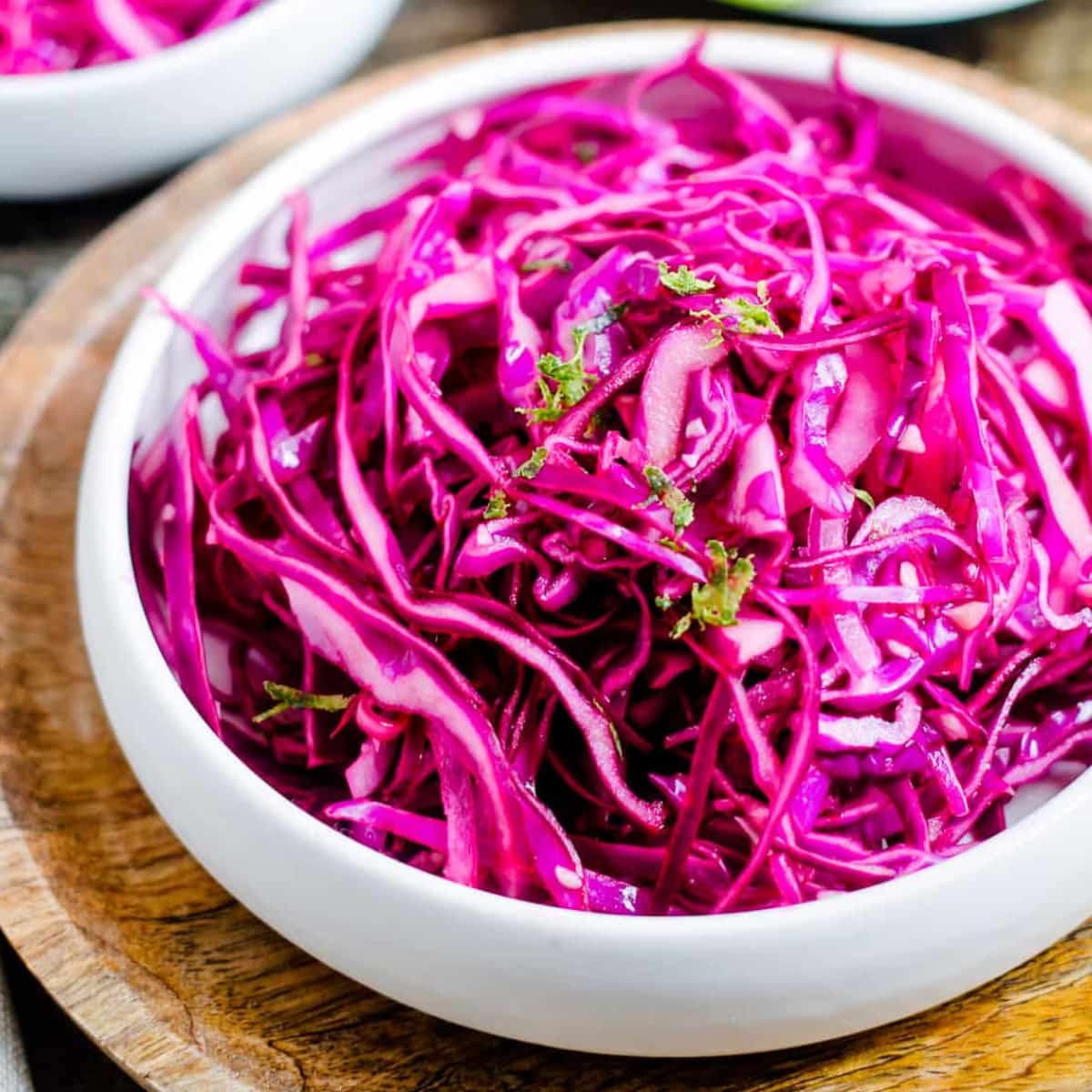 Overhead image of a bowl of red cabbage slaw.