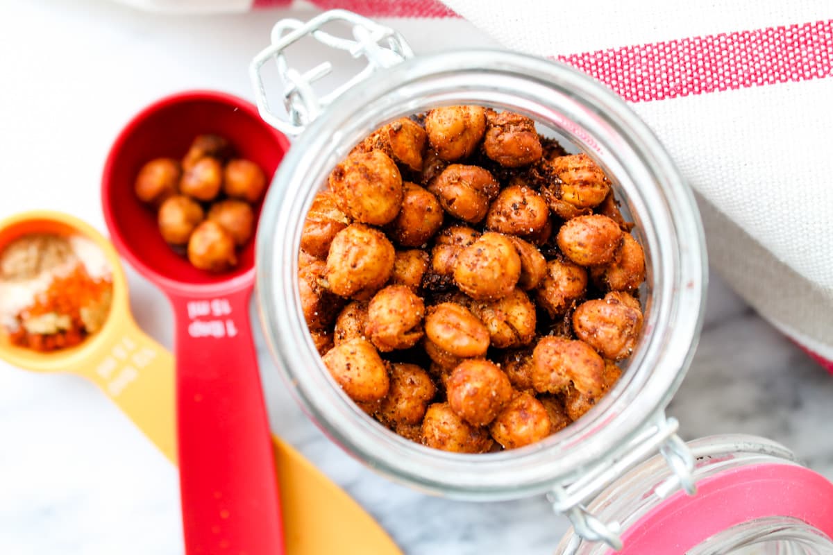 A jar of spicy roasted chickpeas.