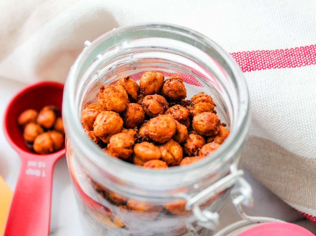 A jar of spicy roasted chickpeas.