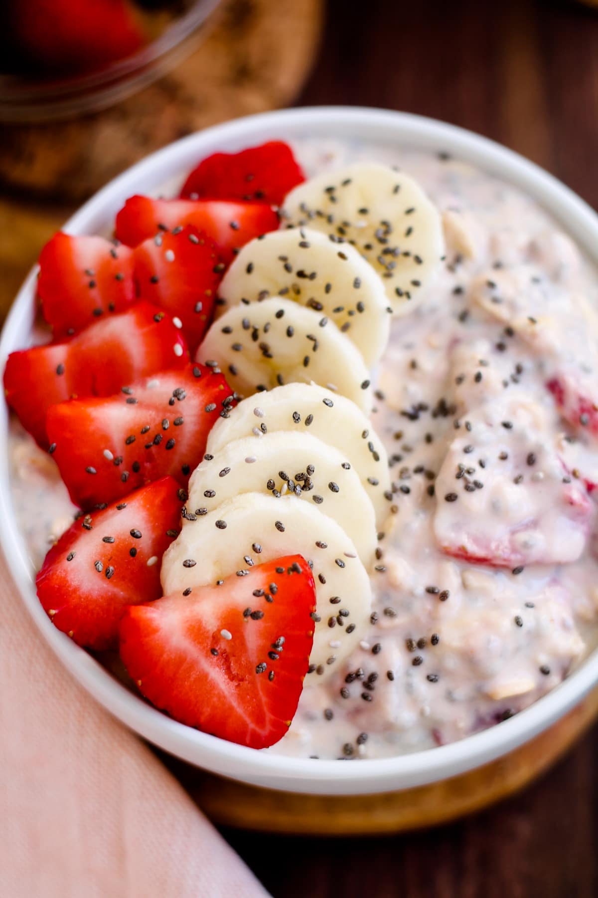 Overhead image of a bowl of strawberry overnight oats.