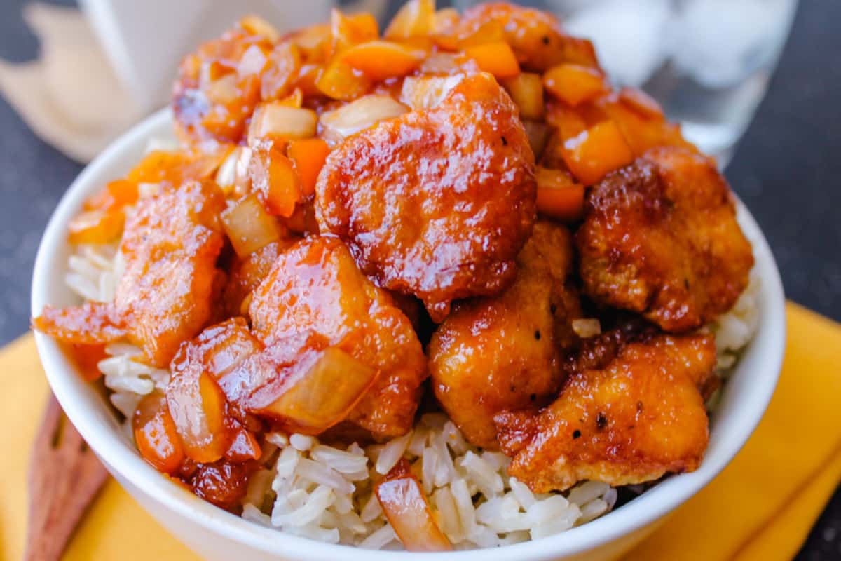 A bowl of homemade sweet and sour chicken.