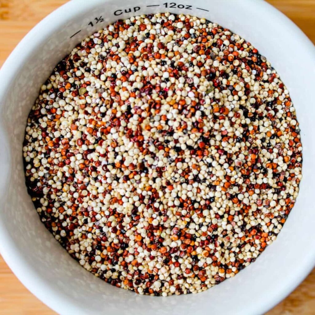 A cup of dried quinoa.
