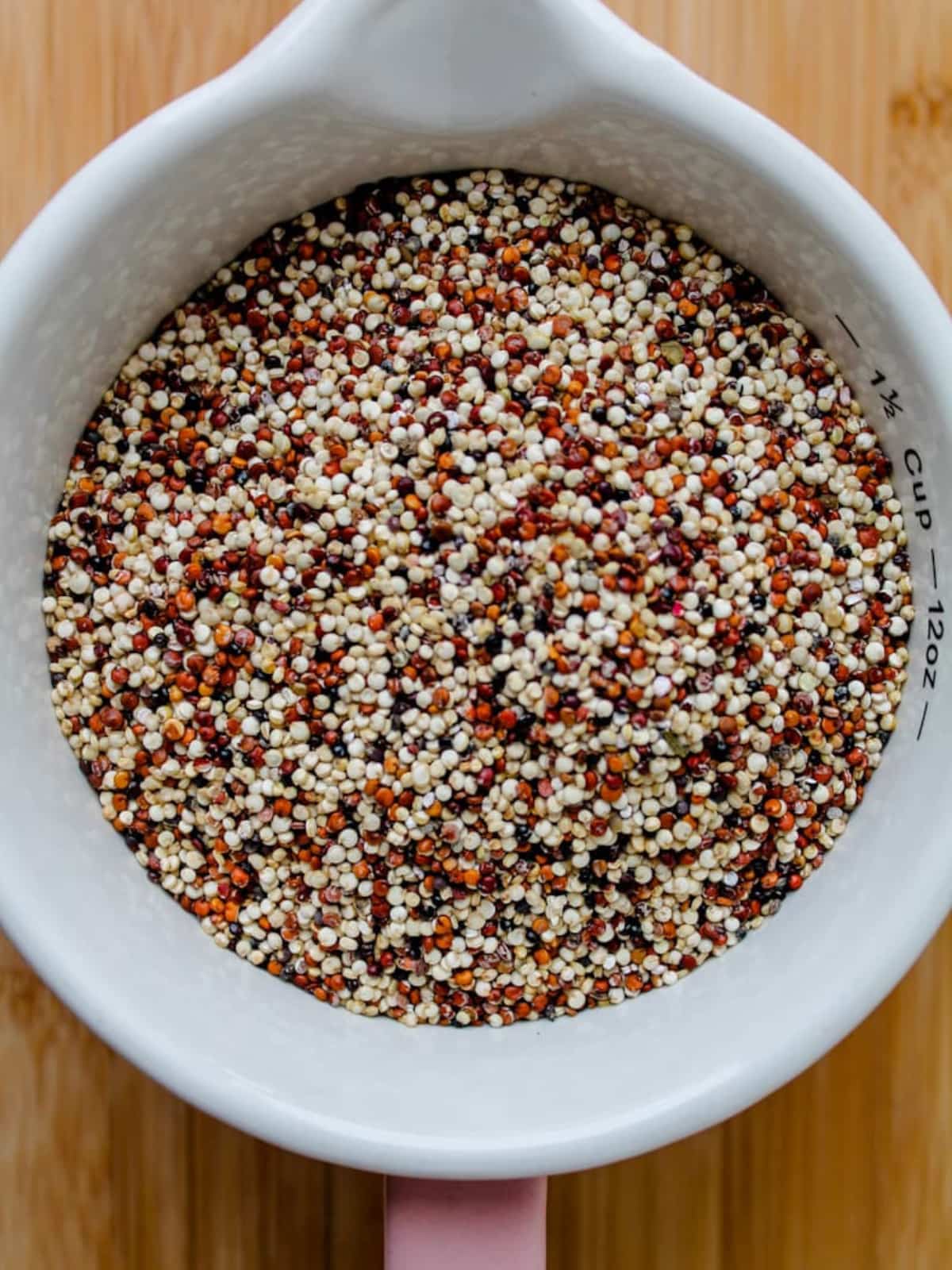 A cup of dried quinoa.