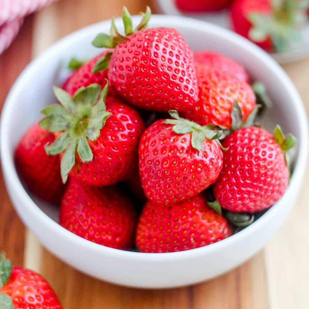 A bowl of strawberries.