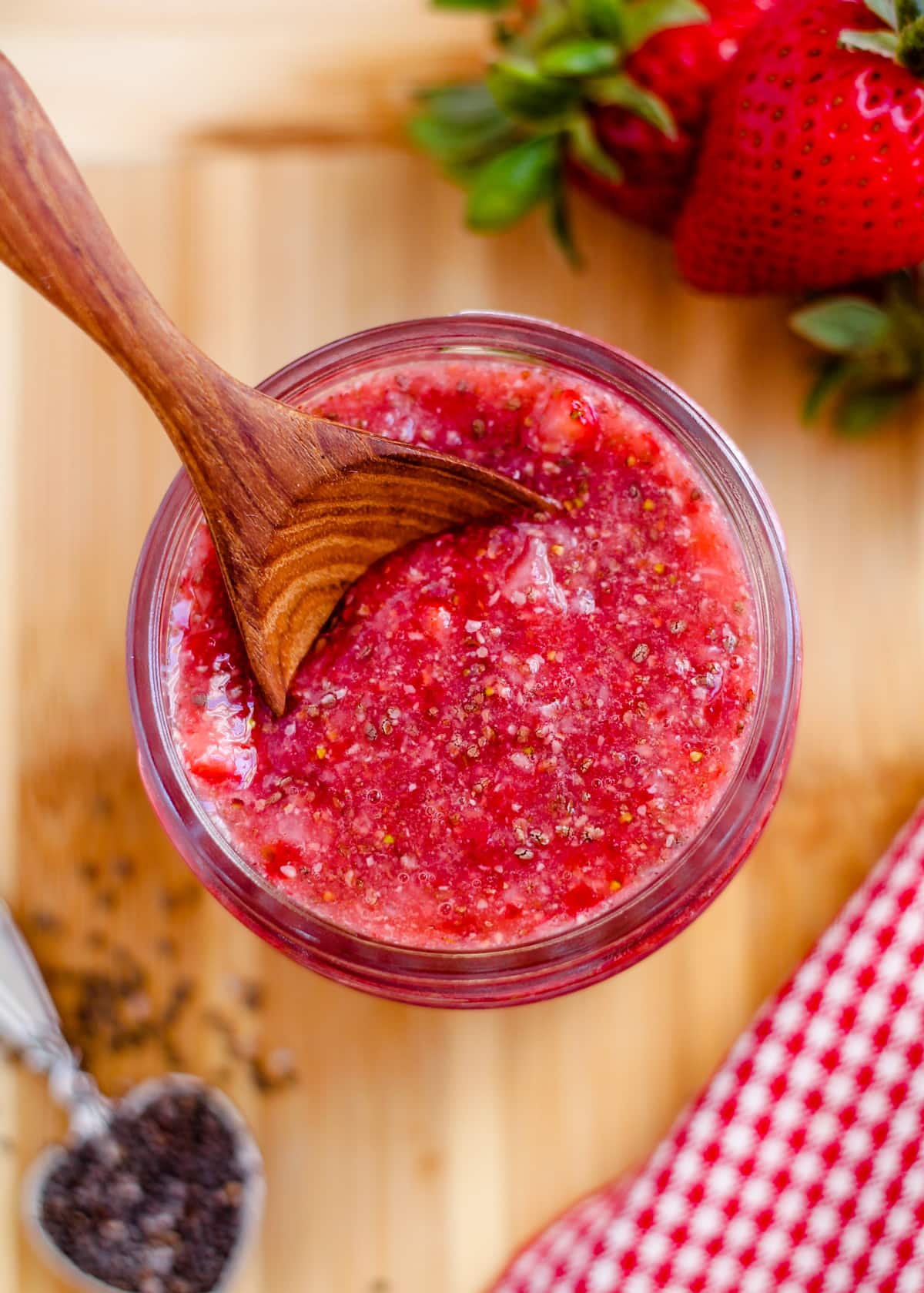 A jar of strawberry chia jam.