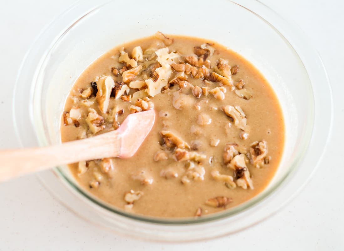 Ingredients being stirred in a bowl.