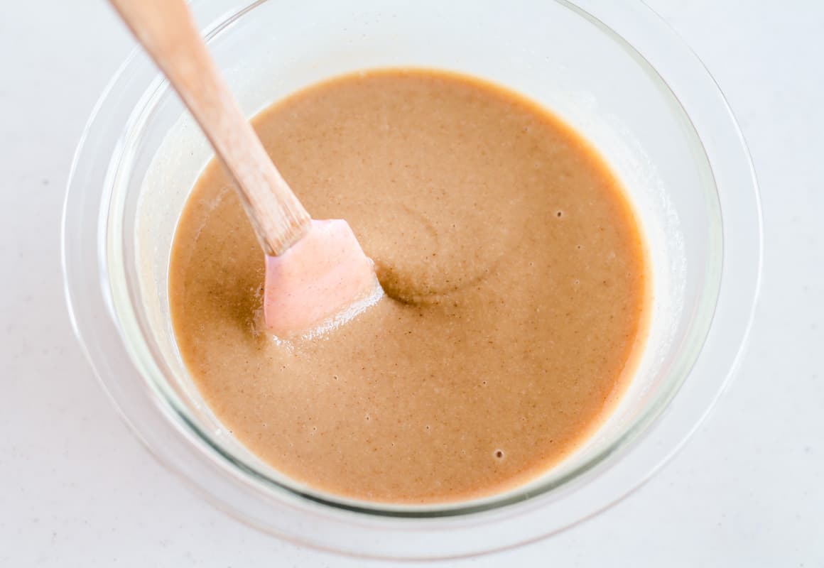 Ingredients being stirred in a bowl.