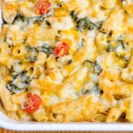Creamy chicken pasta in a casserole dish.