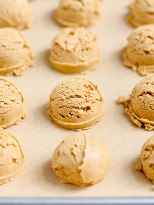 Protein bites on a tray ready for the freezer.