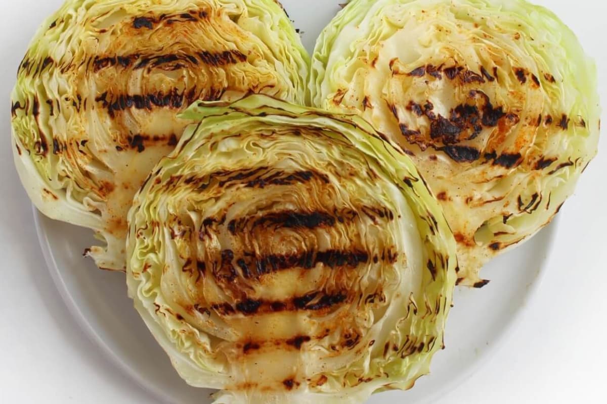 A plate of grilled cabbage steaks.