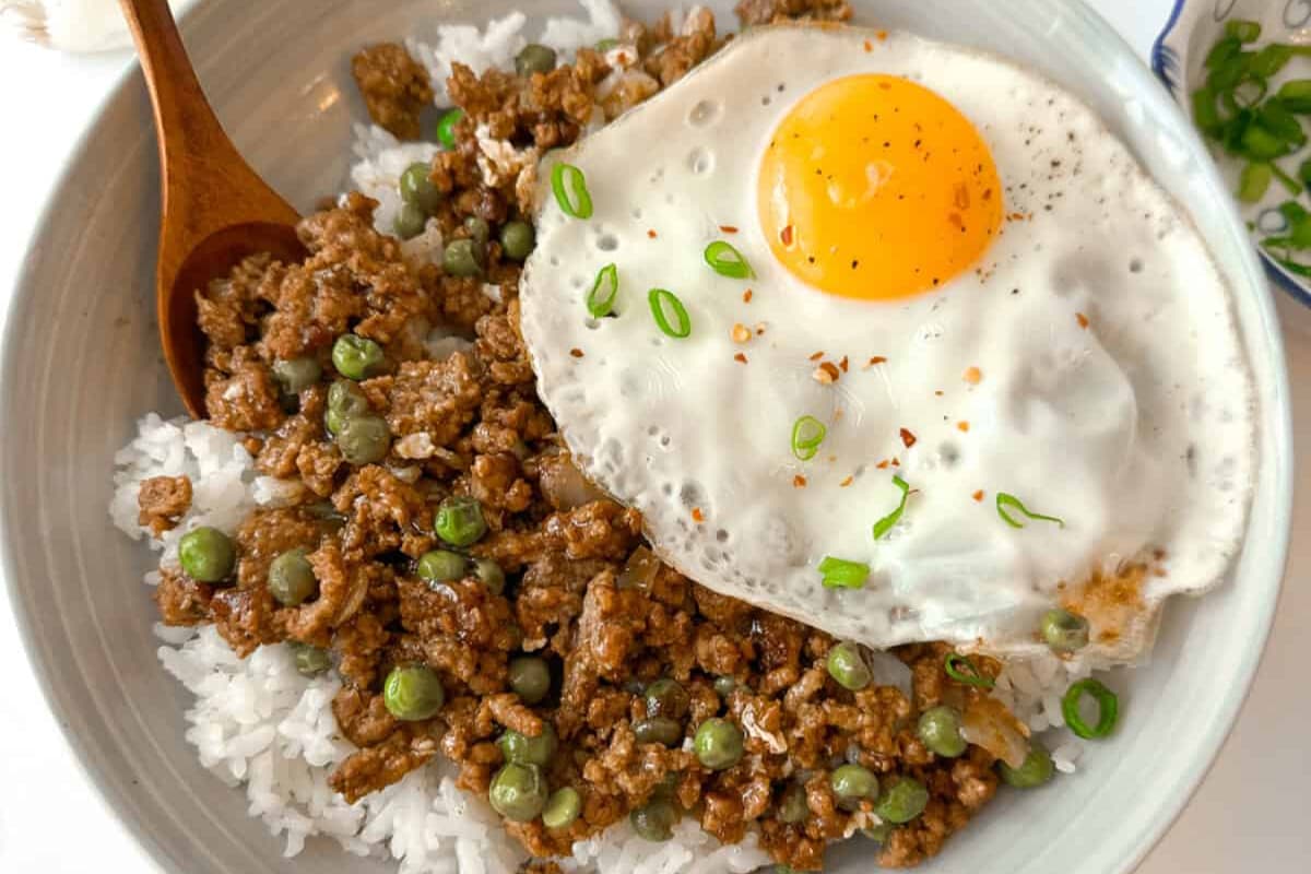 A plate of ground beef and eggs.