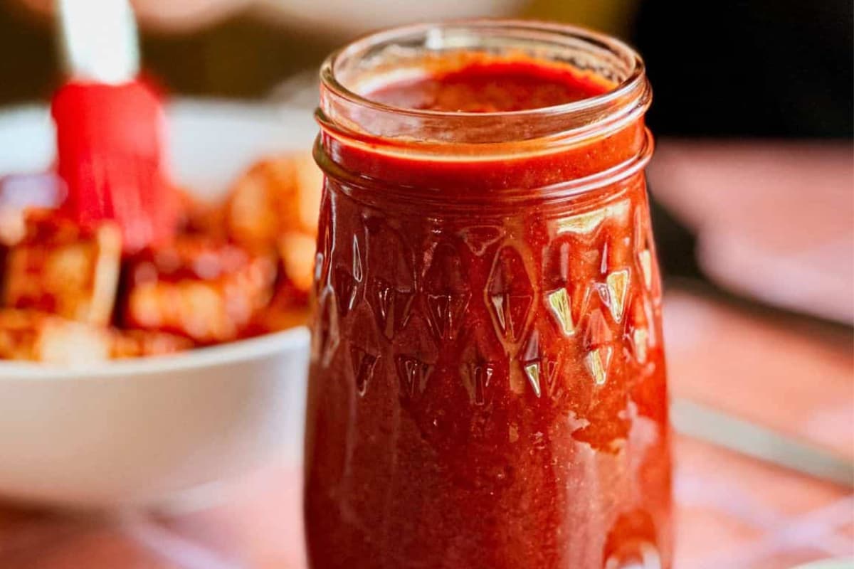 A jar of homemade cherry bbq sauce.