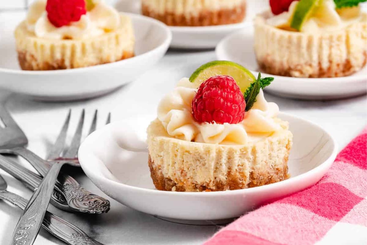 Key lime cheesecake on a plate.