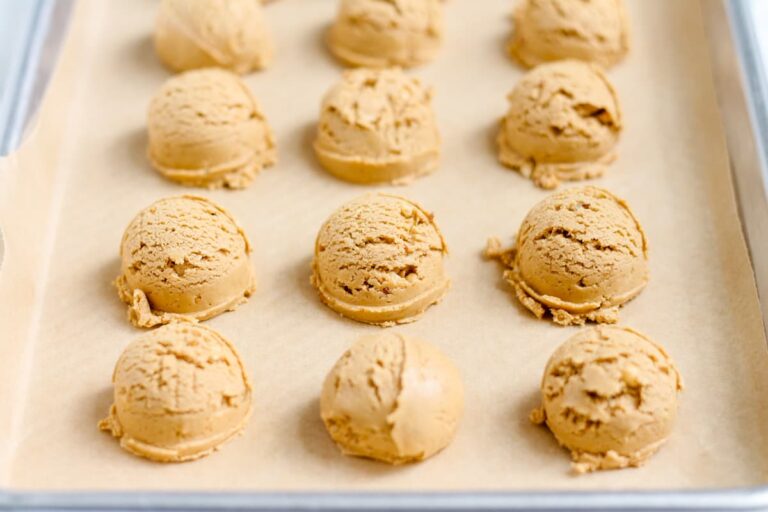 Protein bites on a tray ready for the freezer.