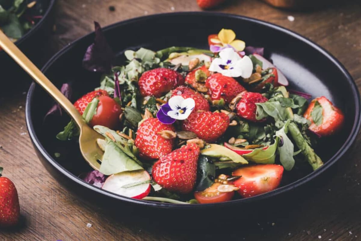 A plate of strawberry salad.