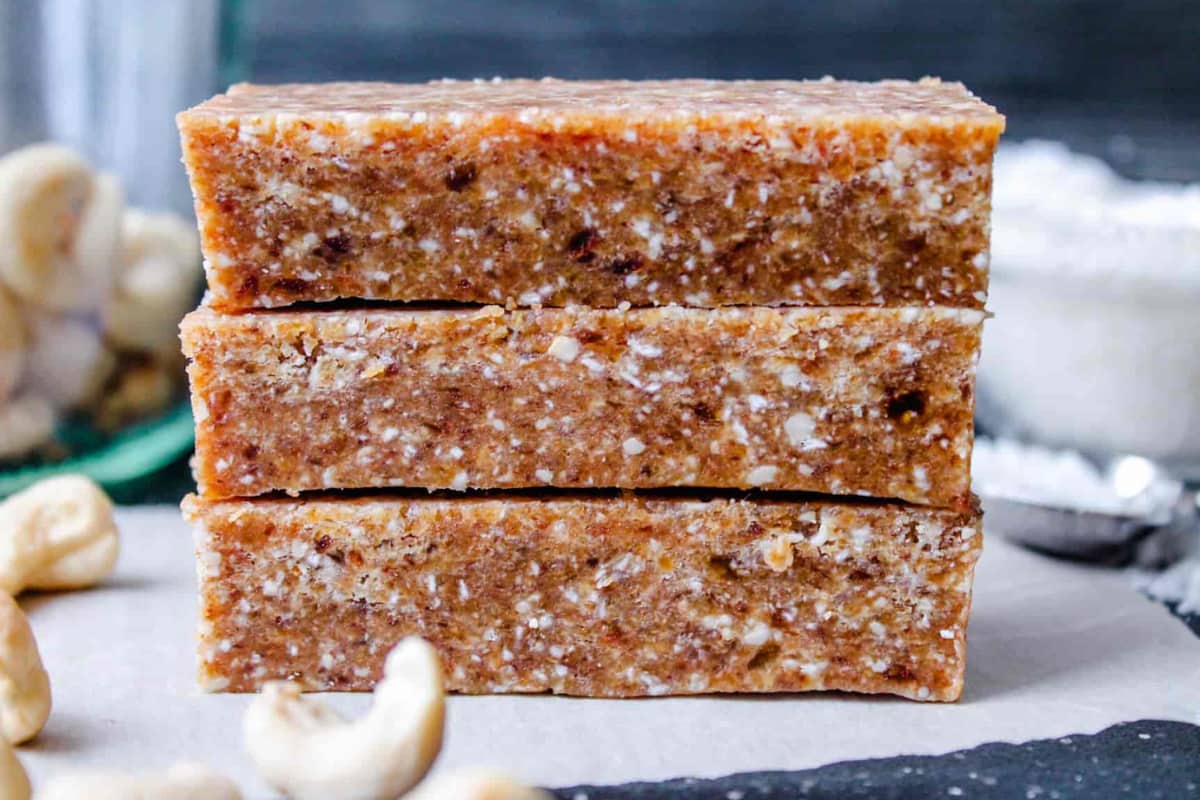 A stack of toasted cashew coconut bars.