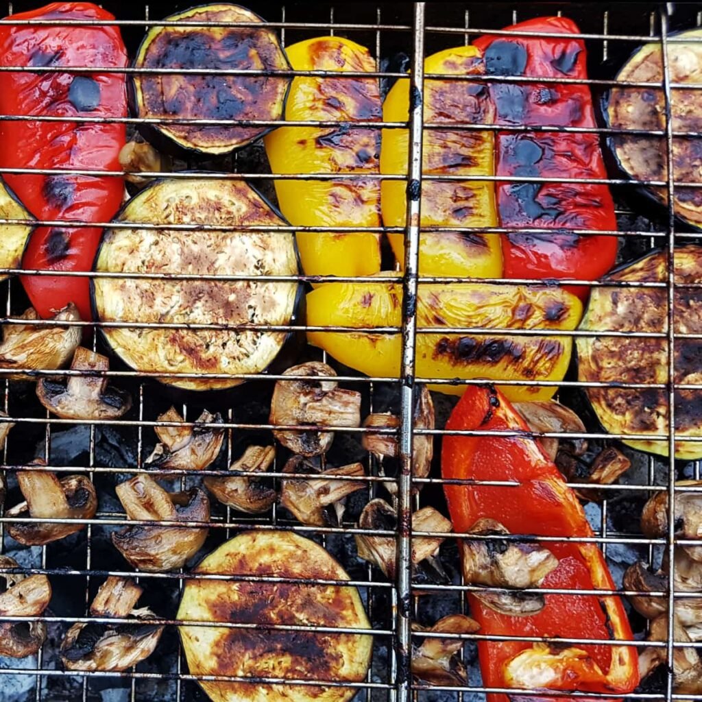 Veggies on a grill.