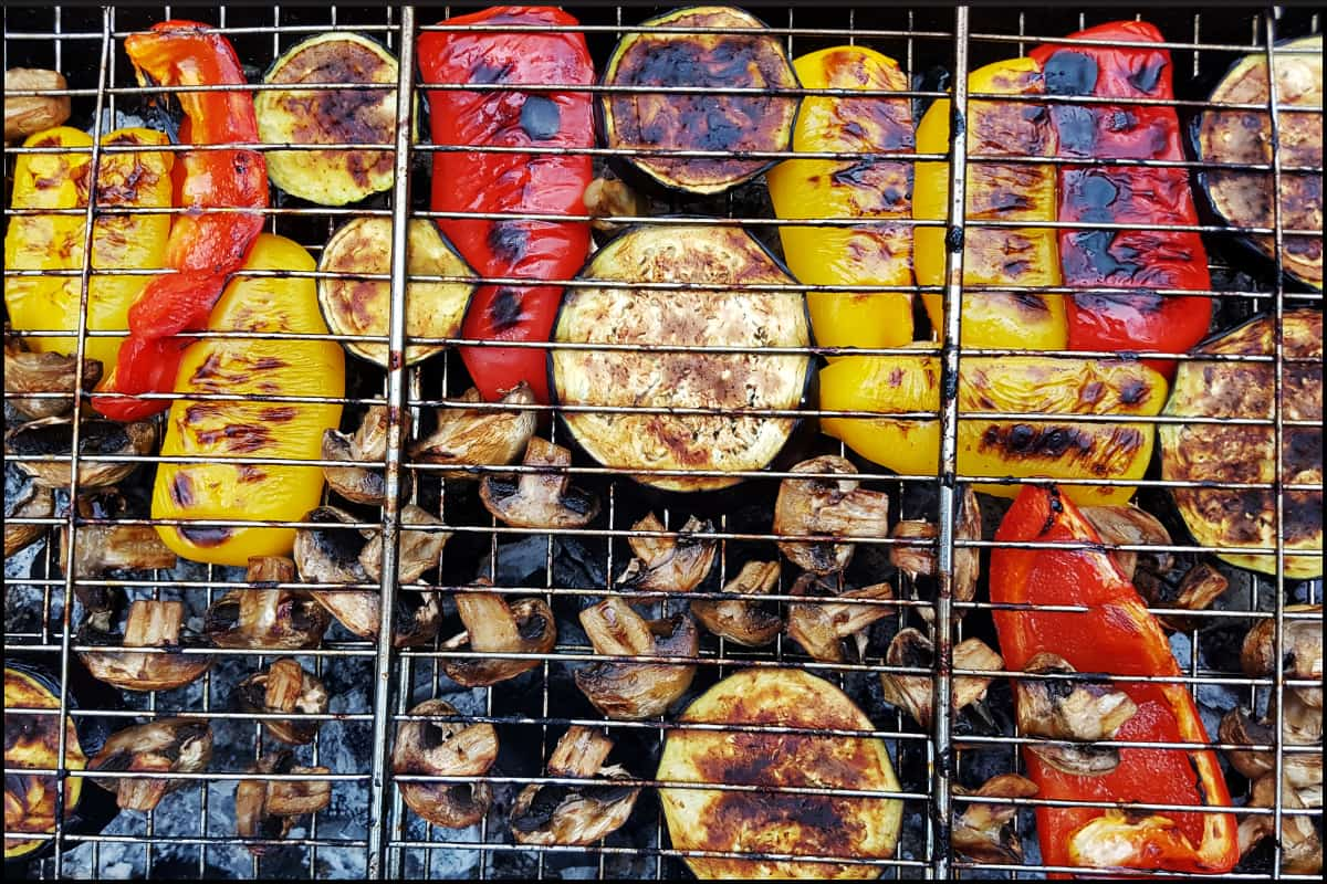 Veggies on a grill.