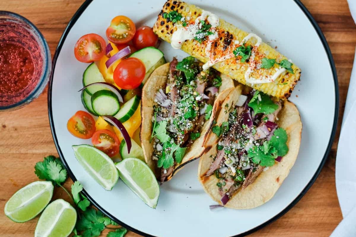 Chimichurri steak tacos on a plate.