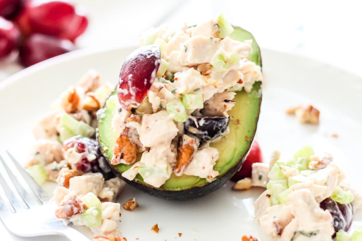 A plate of avocado chicken salad.