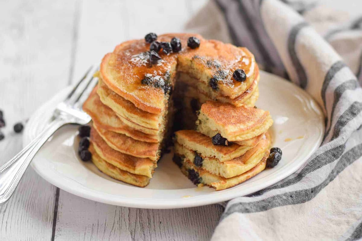 A plate of blueberry pancakes.