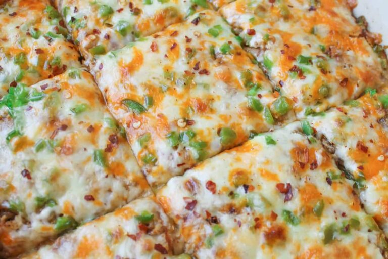 Chicken enchilada bake in a casserole dish.