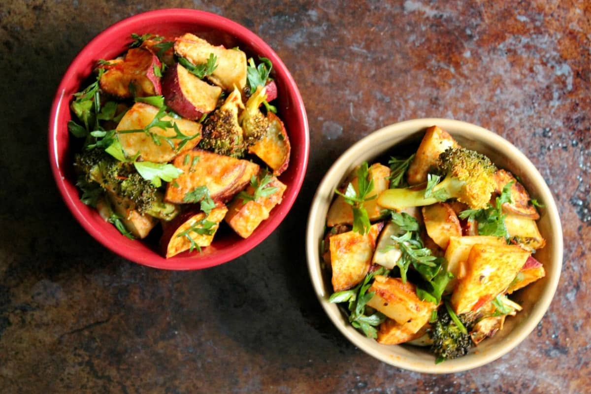 Two bowls of harissa potato salad.