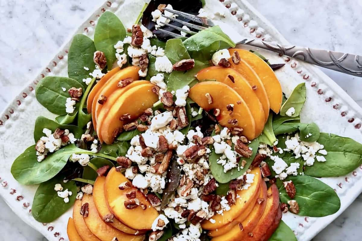 A plate of pecan peach salad.