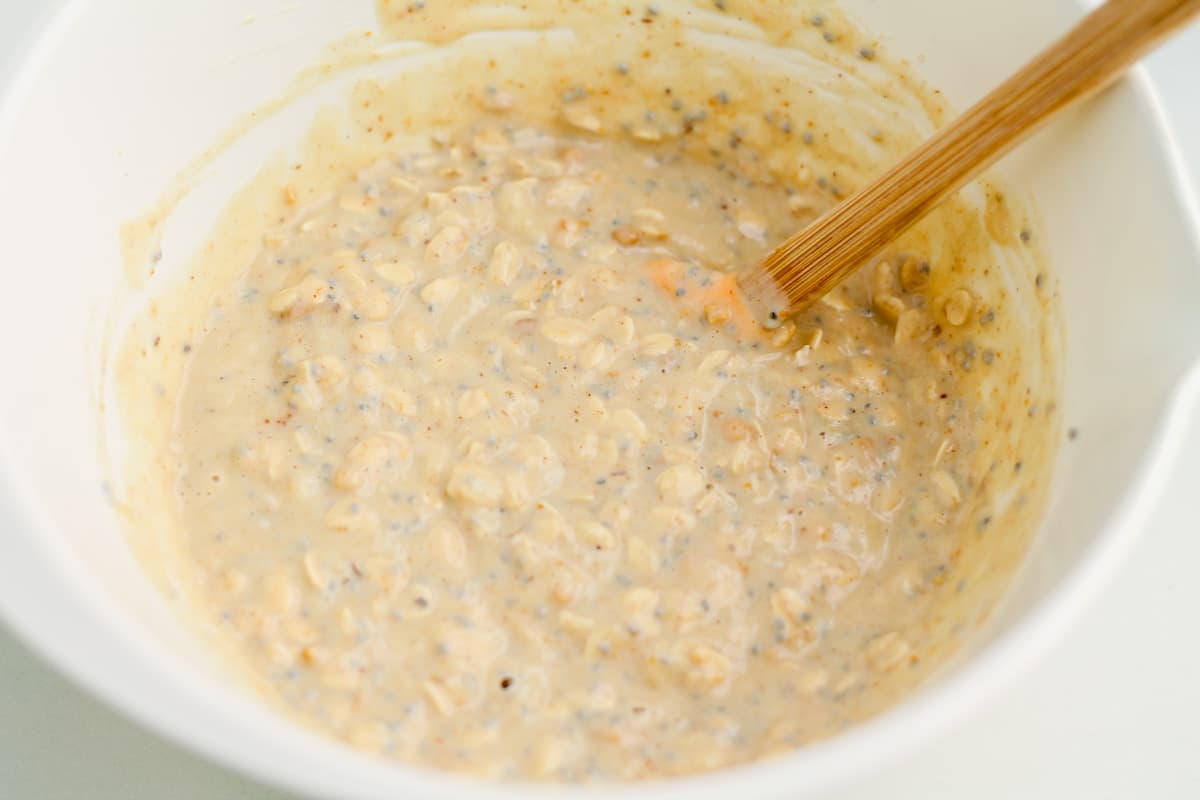 A mixture being stirred in a bowl.