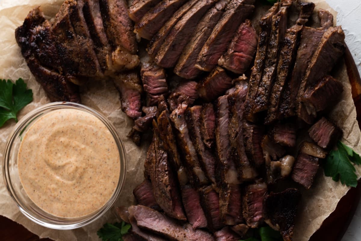 A platter of reverse sear steak.