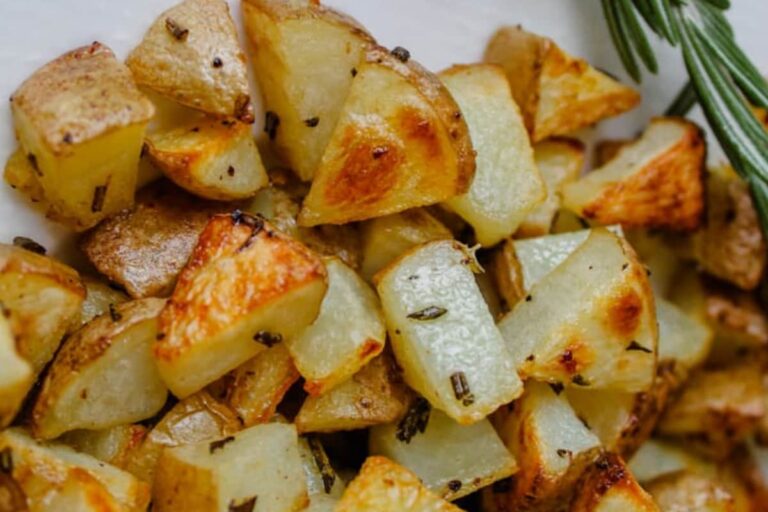 A plate of rosemary potatoes.