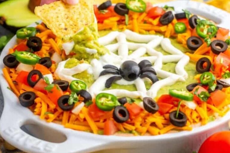 A bowl of Halloween taco dip.