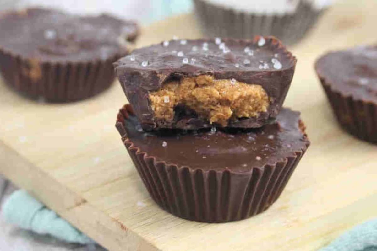 Almond butter cups on a counter.